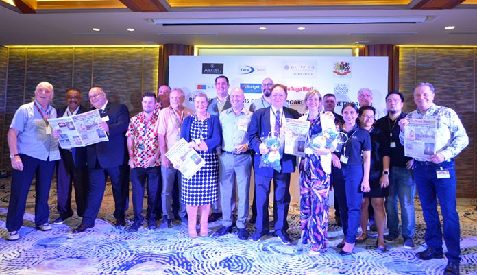 Representatives of the Joint Chambers in Thailand, sponsors and media partners join in for a group photograph, some holding a copy of the Pattaya Mail, the best English language newspaper in Pattaya and the Eastern Seaboard.