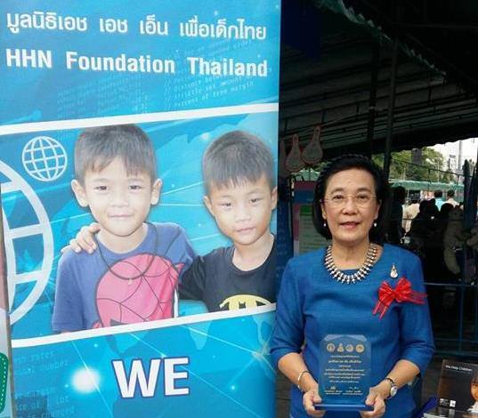 HHN Director Radchada Chomjinda on behalf of the Human Help Network Thailand accepts the award for their children’s charity work with orphans, children and youths.