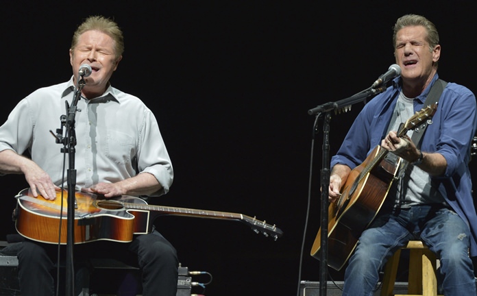 In this Jan. 15, 2014, file photo, Don Henley (left) and Glenn Frey of The Eagles perform at the Forum in Los Angeles. (Photo by John Shearer/Invision/AP)