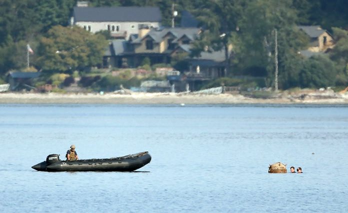 (Meegan M. Reid/Kitsap Sun via AP)