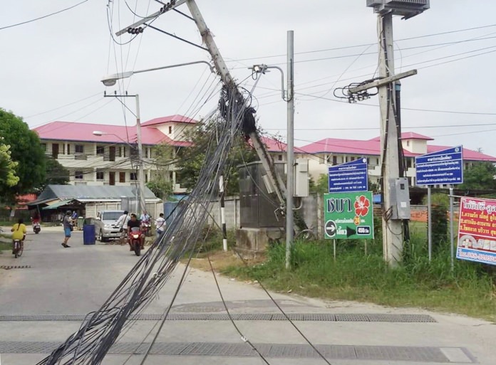 Moving at normal speed, Chuchart Topai hit the wires and continued on, causing one power pole to topple into the road and a second to lean badly.