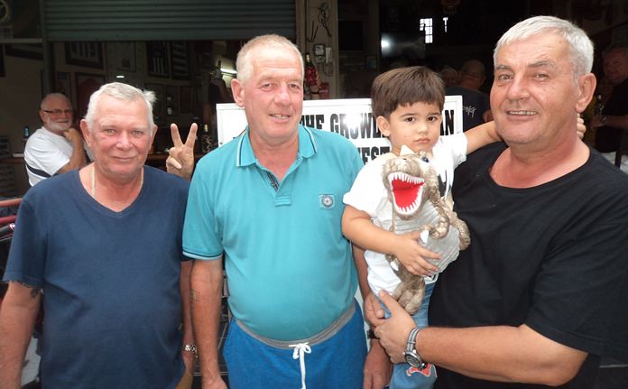 (L to R) Steve Younger, Phil Moore and Martin Kempton with young Thomas Kempton holding Dino the dinosaur.