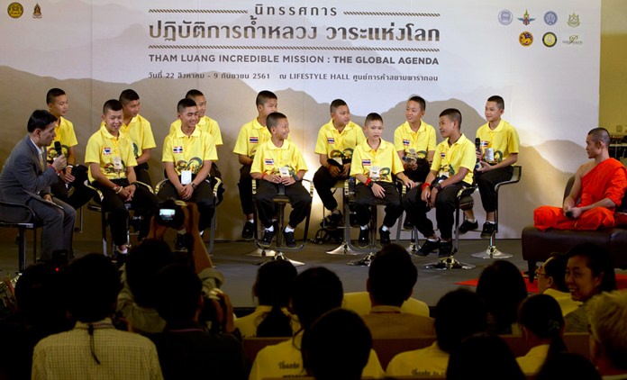 Members of the Wild Boars soccer team attend a public discussion in Bangkok, Thailand, Thursday, Sept. 6, 2018. They spoke Thursday at an exhibition about their ordeal of being trapped for almost three weeks in a flooded cave, at one of Bangkok's largest shopping malls. (AP Photo/Gemunu Amarasinghe)