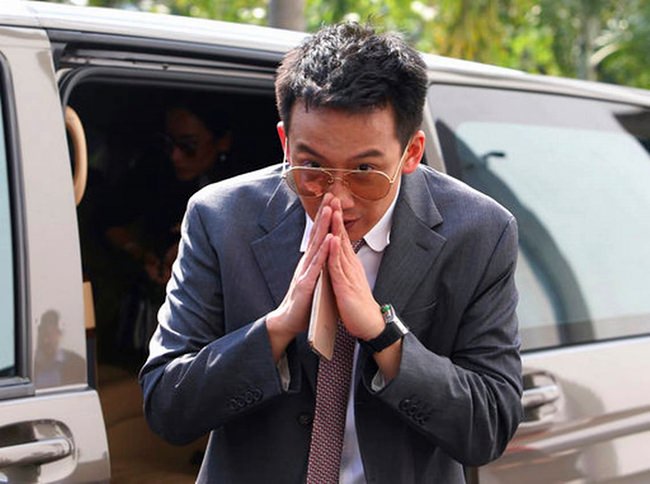 Phantongtae Shinawatra, son of ousted Prime Minister Thaksin Shinawatra, arrives at prosecutor's office Bangkok, Wednesday, Oct. 10. (AP Photo)