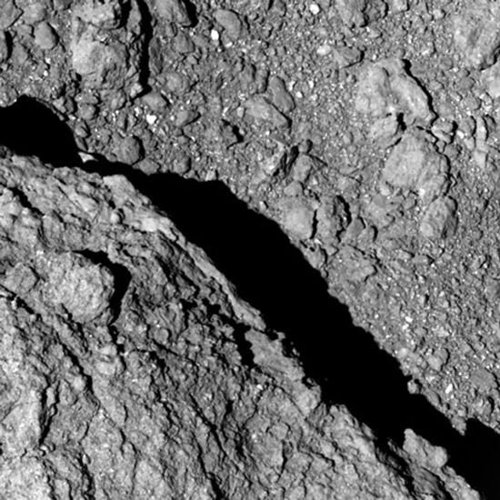 New photos taken on the surface of an asteroid show that it is (drumroll, please) ... rocky. (JAXA via AP)