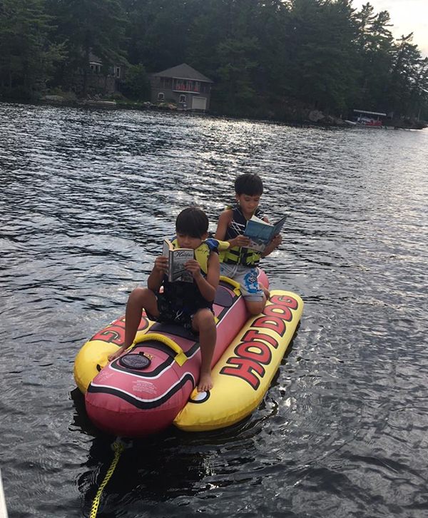 Taking to the water, while reading. 
