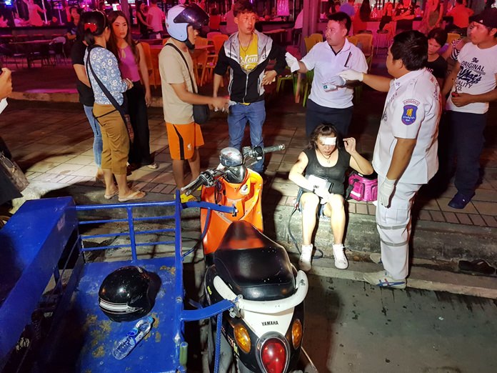 A Cambodian waiter and his date were injured when their motorbike was hit by a reversing pickup truck in Naklua.
