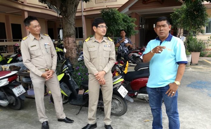 Sutat Nutchpan, director of the Provincial Waterworks Authority’s Pattaya office, and his staff pay a visit to a group of homeowners of Khopai Soi 11 where numerous homes in the heavily developed South Pattaya neighborhood have not had running tap water for 20 years.