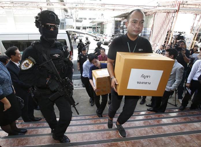 Thai police handed over around 100 kilograms of seized marijuana to be used for medical research, as officials seek to produce pot-based medication. (AP Photo/Sakchai Lalit)