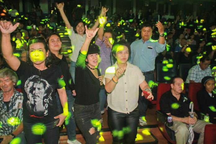 Carabao fans dance in the aisles to their favorite tunes.