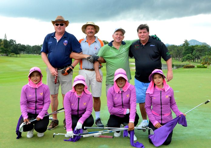 Dark clouds can’t dampen the fun for this group.