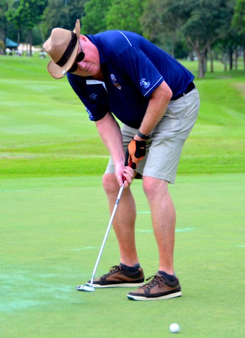 Putting for glory at the T.Q. Masters.