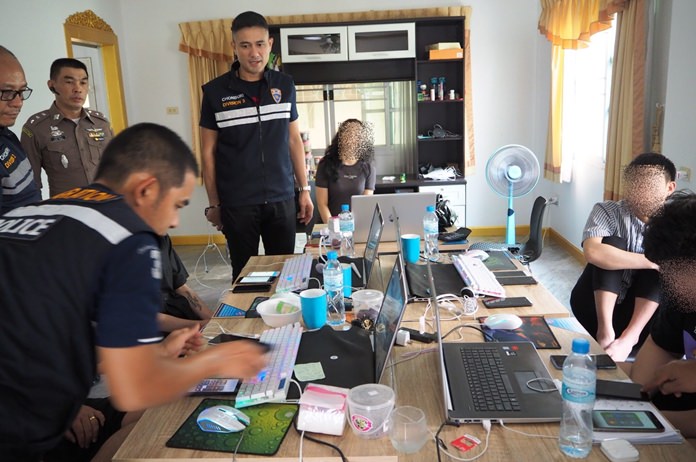 Pattaya immigration police arrested 13 Chinese nationals on charges of working without a permit in a loan-shark call center aimed at extorting mainland victims.