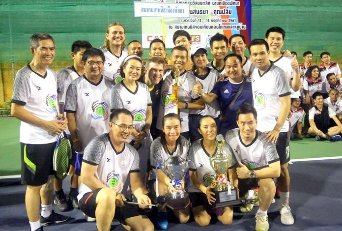 Pattaya Tennis Club players celebrate after retaining the title for the fourth year running.