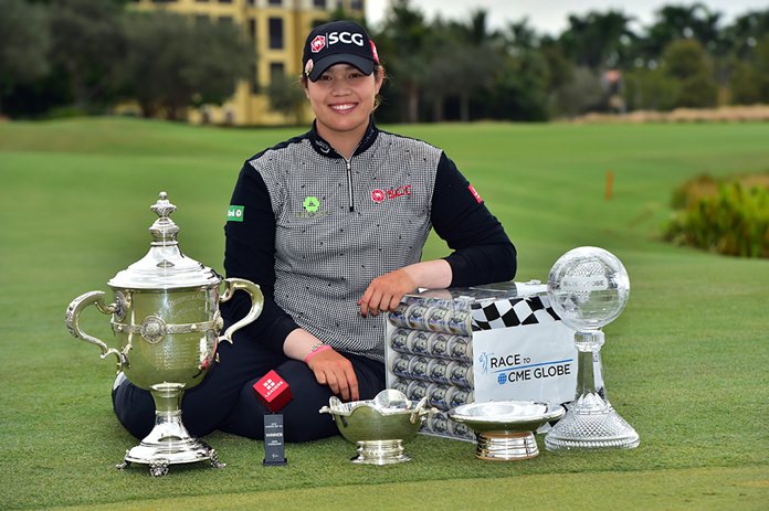 Thailand’s Ariya Jutanugarn poses with her season’s trophies after the final round of the CME Group Tour Championship in Naples, Florida, Sunday, November 18.