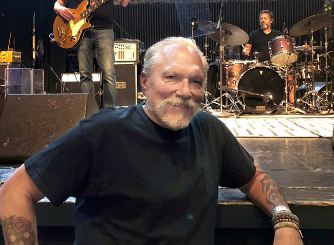Jorma Kaukonen poses for a photo before a Hot Tuna gig at the El Rey Theatre in Los Angeles. (AP Photo/John Rogers)
