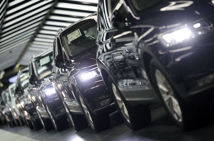 In this March 8, 2018 file photo, Volkswagen cars are pictured during a final quality control at the Volkswagen plant in Wolfsburg, Germany. (AP Photo/Michael Sohn)