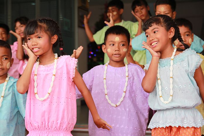 The children perform a lovely traditional dance for the honored guests.