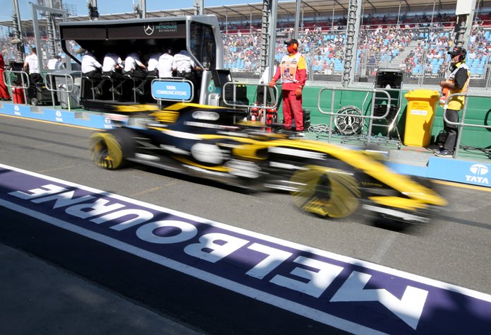 In this file photo dated, Friday, March 23, 2018, a Renault car drives down pit lane during the first practice session at the Australian Formula One Grand Prix in Melbourne. (AP Photo/Rick Rycroft)
