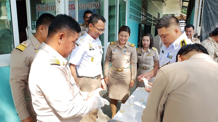 Sattahip officials, village chiefs and civil-defense volunteers submitted themselves to drug tests to gain the trust of district residents. None of those who volunteered failed their test.