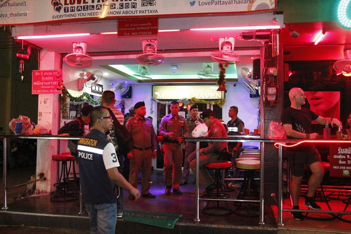 Department of Special Investigations human-trafficking officers joined immigration and tourist police in the Dec. 4 raid on the Miss B Haven bar.