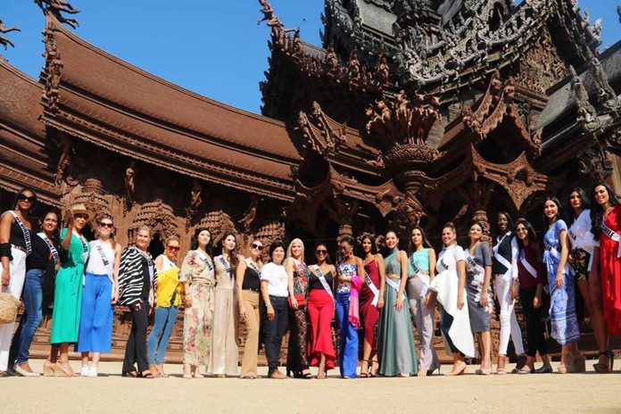 Contestants gather for a group photo in front of the Sanctuary of Truth in Naklua.