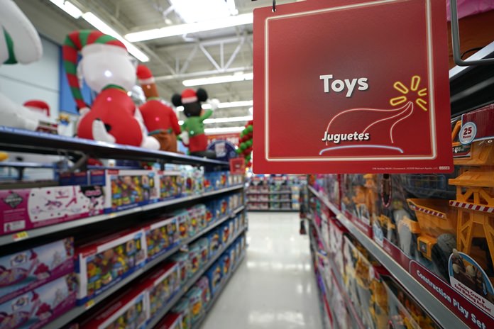 Toys sit on the shelves at a Walmart Supercenter in Houston. Pediatricians say the best toys for young children are simple, old-fashioned toys like blocks and puzzles rather than costly electronic games or the latest high-tech gadgets. (AP Photo/David J. Phillip, File)