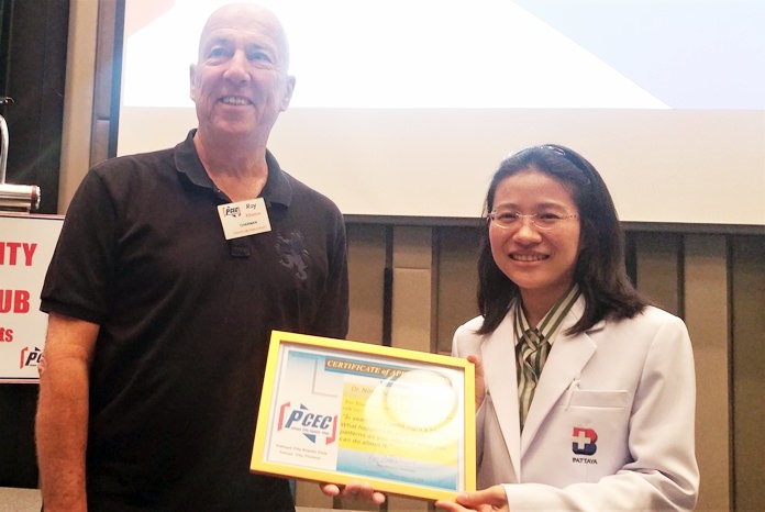 MC Roy Albiston presents Dr. Niratchada with the PCEC Certificate of Appreciation for her interesting and informative talk about sleep disorders and what can be done about them.