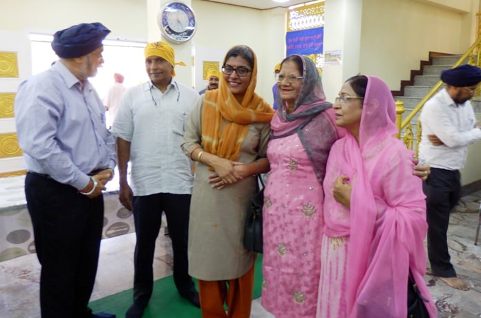 The ambassadors are greeted by the Sikh elders.