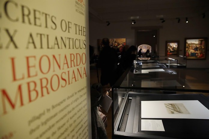 Visitors attend a press presentation of the 'Secrets of the Codex Atlanticus. Leonardo at the Ambrosiana" exhibition, at the Ambrosiana Library in Milan, Italy, Tuesday, Dec. 18. (AP Photo/Luca Bruno)