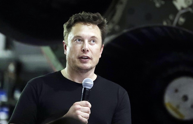 In this Sept. 17, 2018, file photo SpaceX founder and chief executive Elon Musk speaks in Hawthorne, Calif. Musk is asking a California judge to throw out a lawsuit filed against him by a British diver who accused the tech entrepreneur of falsely calling him a pedophile. (AP Photo/Chris Carlson, File)