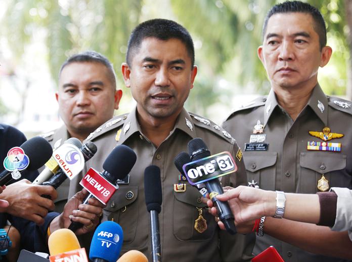 Chief of Immigration Police Maj. Gen. Surachate Hakparn talks to media about Rahaf Mohammed Alqunun outside the Saudi Arabia Embassy in Bangkok Tuesday, Jan. 8. (AP Photo/Sakchai Lalit)