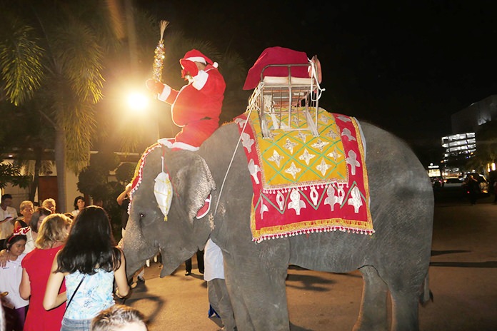 Santa arrived on the back of an elephant to hand out gifts to deserving children who appeared on the “nice” list at the Thai Garden Resort.