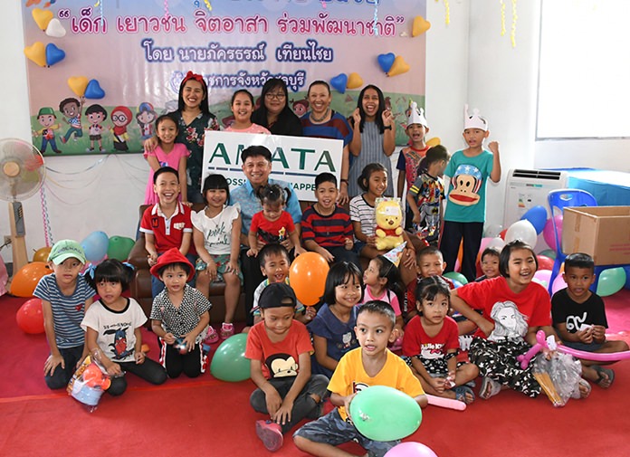 Chonburi Gov. Pakarathorn Thienchai welcomes area children into the provincial hall for a tour.