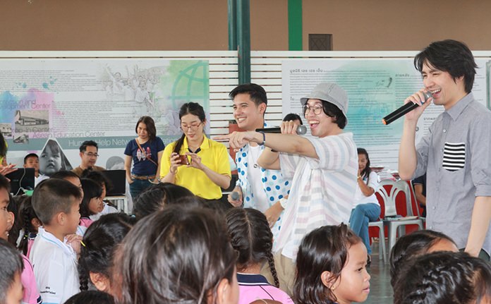 Ruth and Dew the Star team sing songs and participate in Children’s Day activities at HHNFT, creating smiles and laughter.