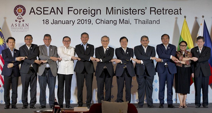 Foreign ministers of the Association of Southeast Asian Nations (ASEAN) join hands for a group photo during the ASEAN Foreign Ministers’ retreat in Chiang Mai, Thailand, Friday, Jan. 18, 2019. They are from left to right, Laos’ Saleumxay Kommasith, Myanmar’s Kyaw Tin, Malaysia’s Saifuddin Abdullah, Philippines Foreign Affaires Secretary Teodoro Locsin Jr., Singapore’s Vivian Balakrishnan, Thailand’s Don Pramudwinai, Vietnam’s Phm Binh Minh, Brunei Second Minister of Foreign Affaires and Trade Erywan Yusof, Cambodia’s Prak Sokhon, Indonesia’s Retno Marsudi and ASEAN Secretary-General Dato Lim Jock Hoi. (AP Photo/Gemunu Amarasinghe)