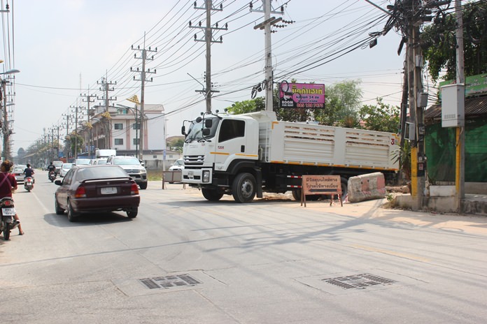 Drivers were urged to slow down and drive carefully around roadwork underway on Soi Pornprapanimit 18.