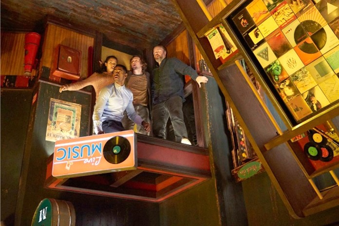 This image released by Sony Pictures shows Jay Ellis, Taylor Russell, Logan Miller and Tyler Labine in “Escape Room.” (David Bloom/Sony Pictures via AP)