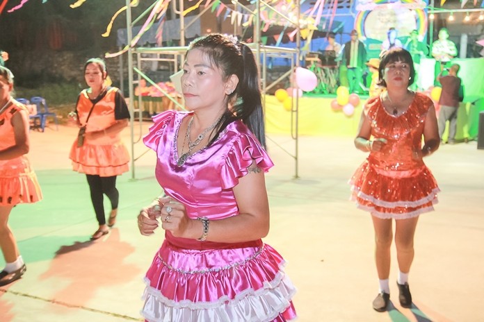 Nongprue residents put on a song and dance show to raise money for senior citizens and schoolkids.