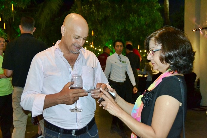 Majic Beauty Cosmetics MD Rocky Mammone and Pattaya Mail’s Sue Kukarja exchange business cards.
