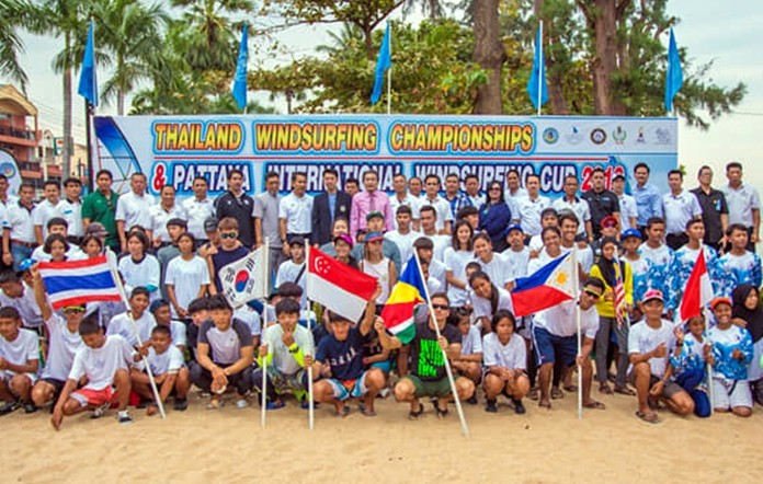 Sailors from nine countries pose for a group photo during the Thailand Windsurfing Championships held at Jomtien Beach in Pattaya from January 17-20.