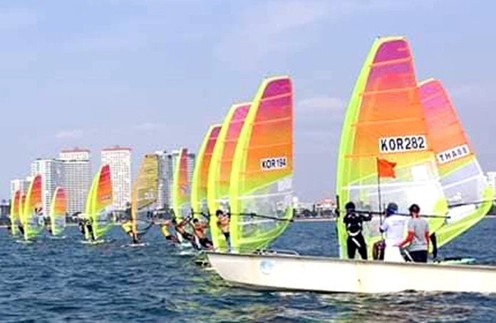 Windsurfers line up at the start of another race.