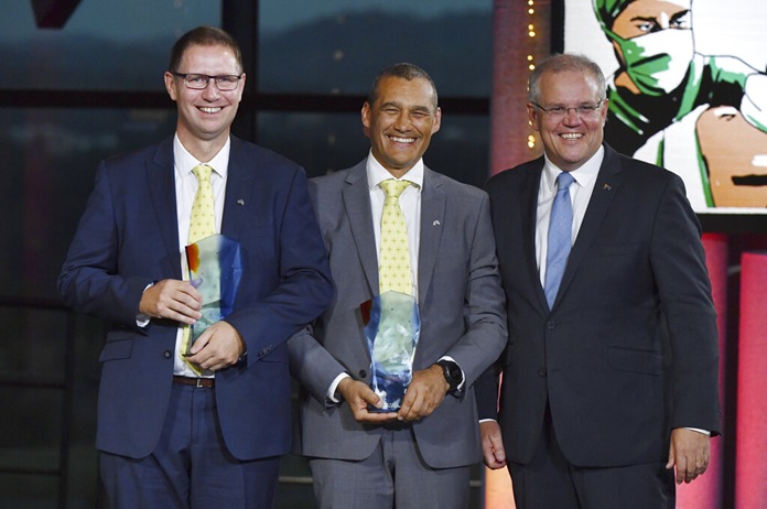 Prime Minister Scott Morrison, right, stands with Dr. Richard Harris, left, and Craig Challen at the 2019 Australian of the Year Awards in Canberra, Australia, Friday, Jan. 25. (Mick Tsikas/AAP Image via AP)