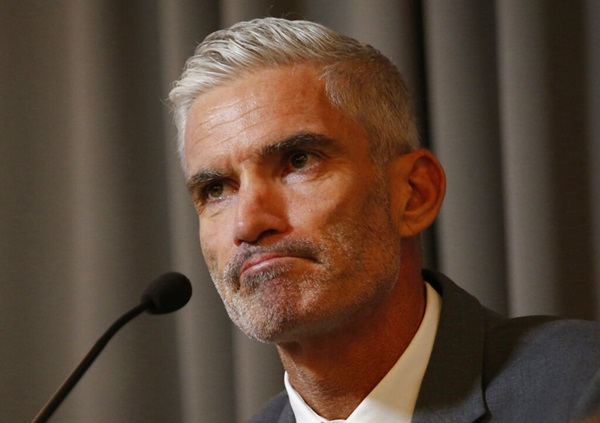 Former Australian soccer national team member Craig Foster talks to journalists at The Foreign Correspondents' Club of Thailand after meeting detained refugee Hakeem al-Araibi in Bangkok, Thailand, Friday, Jan. 25. (AP Photo/Sakchai Lalit)