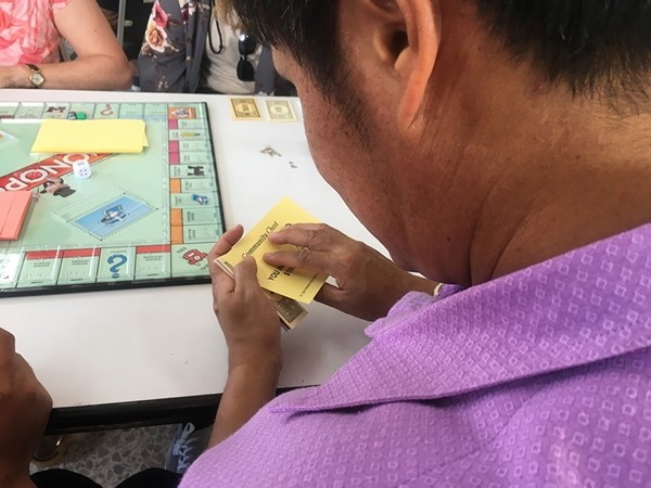 He won $100 in a beauty contest.