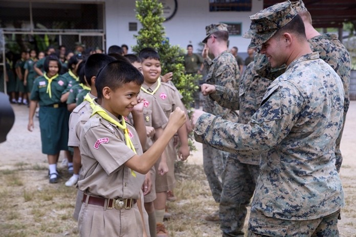 U.S. Marines greet students during a cooperative health engagement event as part of exercise Cobra Gold 19 at Ban Wang Mai Daeng School, Chanthaburi, Feb. 6, 2019. (U.S. Marine Corps photo by Lance Cpl. Kenny Nunez.)