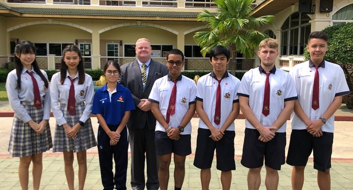 (L to R) Yuna Shigi, Donya Salee, Shana Power, teacher Mr. David Bird, Thirawat Krairattanasom, Eisen Lance Tamayao De Guzman, Nikita Ishutin, and Nathanial Nattawoot Hill.