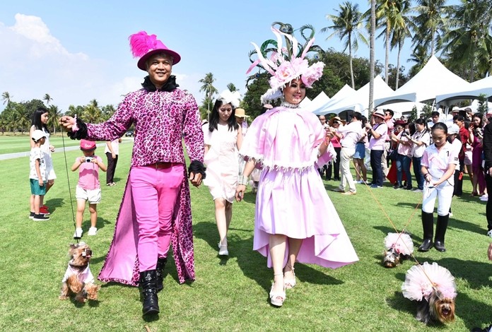 Walking the dog Pink Polo style.