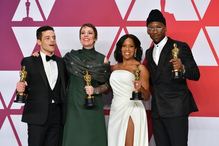 Rami Malek (from left) winner of the “best actor” award, Olivia Colman, winner of the “best actress” award, Regina King, winner of the “best supporting actress” award, and Mahershala Ali, winner of the “best supporting actor” award pose in the press room at the Oscars on Sunday, Feb. 24. (Photo by Jordan Strauss/Invision/AP)