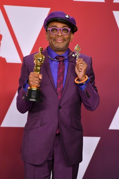 Spike Lee poses with the award for best adapted screenplay for “BlacKkKlansman” in the press room at the Oscars on Sunday, Feb. 24, 2019, at the Dolby Theatre in Los Angeles. (Photo by Jordan Strauss/Invision/AP)